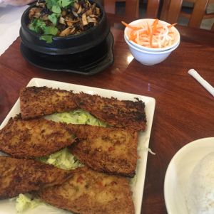 fried fish and mushroom rice in clay pot at Hoa Sen Vegetarian Restaurant in Garden Grove