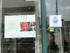 I brought happycow window sticker and owner happily attached it! =) at Wardah in Jeju