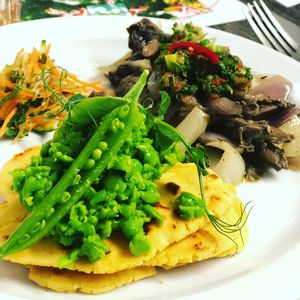 Pea Flatbread with Pea Puree and Thyme Roasted Mushrooms at Pea Shoot in East London