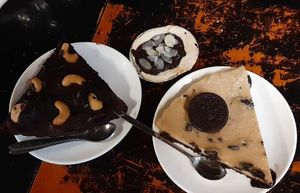 Oreo cake, ganache, raspberry tart. at Filthy Vegan in Ho Chi Minh City