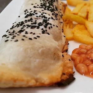 Vegan sausage roll with chips and beans at Filthy Vegan in Ho Chi Minh City
