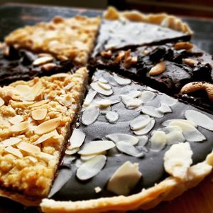 Slices of....chocolate raspberry tart 95.000. Almond Slice 99.000. Chocolate Ganache 99,000 at Filthy Vegan in Ho Chi Minh City