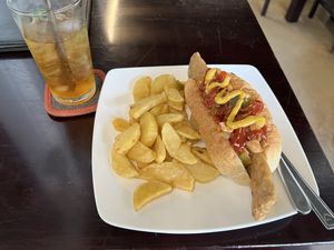 Mexican dog and peach iced tea  at Filthy Vegan in Ho Chi Minh City