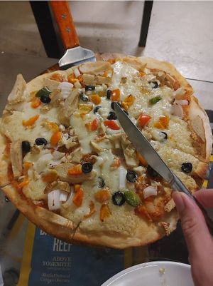 Smoky vegan sausage pizza at Filthy Vegan in Ho Chi Minh City