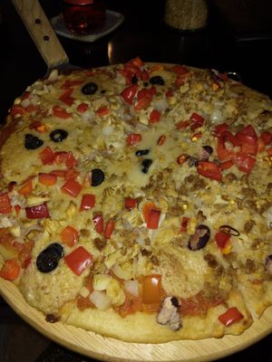 Pizza, half mexican,  half regular vegan at Filthy Vegan in Ho Chi Minh City