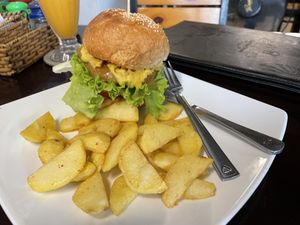 Dal lentil burger with fries and cashew cheese, 160,000 VND  at Filthy Vegan in Ho Chi Minh City