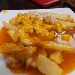 Vegan poutine with chip shop curry sauce at Filthy Vegan in Ho Chi Minh City