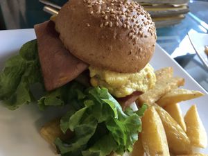 Vegan bacon cashew cheese burger with fries   at Filthy Vegan in Ho Chi Minh City