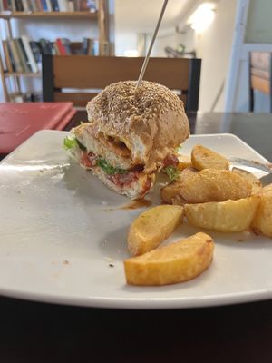 Vegan bacon cheese burger, with fries  at Filthy Vegan in Ho Chi Minh City