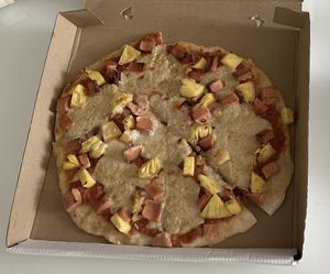 Hawaiian pizza takeaway   at Filthy Vegan in Ho Chi Minh City