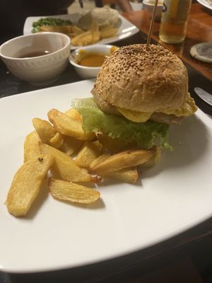 Cheese burger, chips, curry sauce and gravy on the side! Very tasty!   at Filthy Vegan in Ho Chi Minh City