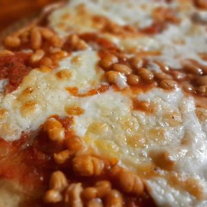 Cashew cheese and baked beans pizza 199.000 at Filthy Vegan in Ho Chi Minh City