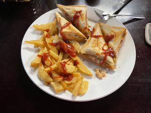 Toastie and chips   at Filthy Vegan in Ho Chi Minh City