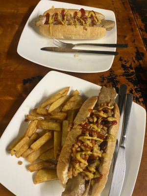 Plain hotdog and mexican hotdog with chips   at Filthy Vegan in Ho Chi Minh City