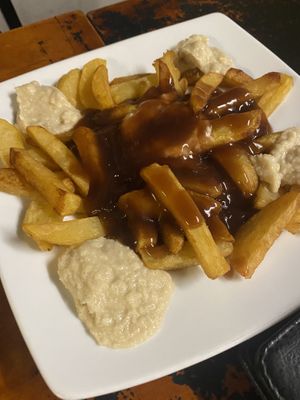 Lodes fries with gravy and cashew cheese   at Filthy Vegan in Ho Chi Minh City