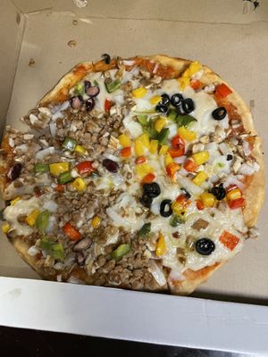 Half half chili sun carne and vegan veggie pizza  at Filthy Vegan in Ho Chi Minh City