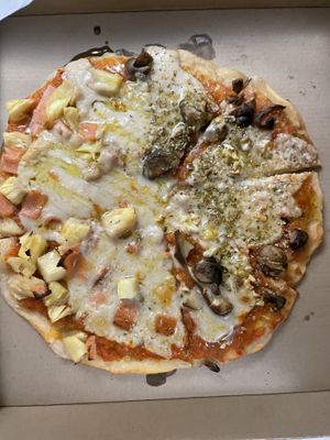 Half half Hawaiian and mushroom and garlic pizza  at Filthy Vegan in Ho Chi Minh City
