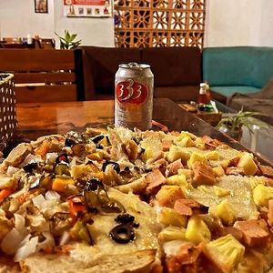 Beer and vegan pizza at Filthy Vegan in Ho Chi Minh City