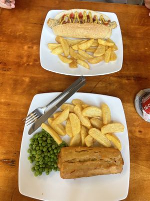 vegan norm hot dog with fries, vegan fish and chips with peas  at Filthy Vegan in Ho Chi Minh City