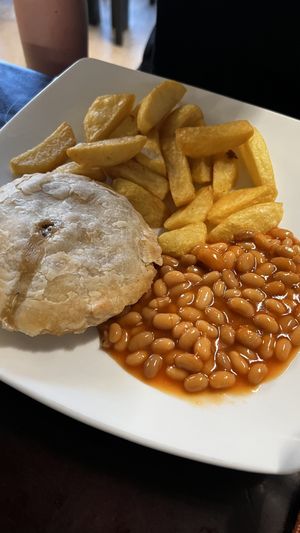 Chicken and mushroom pie with baked beans and chips + gravy on the side (not in the  picture)  at Filthy Vegan in Ho Chi Minh City