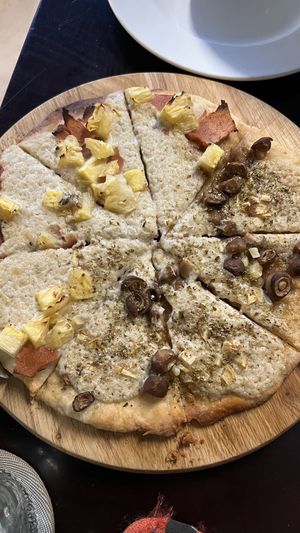 Pizza without tomato sauce - 1/2 Hawaii and 1/2 Mushroom (delicious!)  at Filthy Vegan in Ho Chi Minh City