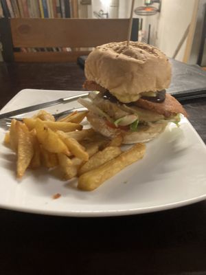Bacon burger and chips   at Filthy Vegan in Ho Chi Minh City