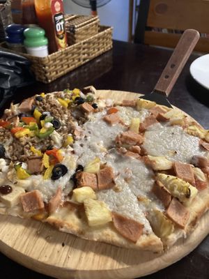 Half and half pizza Hawaiian and meatless  at Filthy Vegan in Ho Chi Minh City