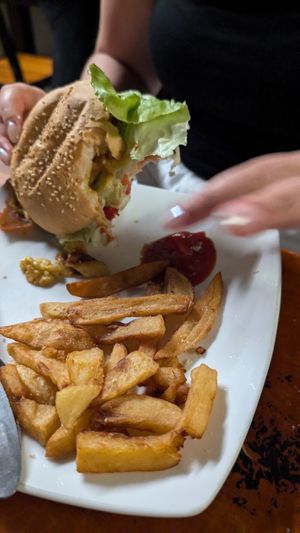 facon bacon cashew cheese burger with homemade chips at Filthy Vegan in Ho Chi Minh City