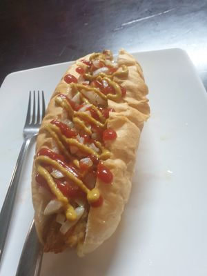 Hot dog - 7/10 good solid dog but bun wasn't as good as insides and crispy onions were slight too hard at Filthy Vegan in Ho Chi Minh City