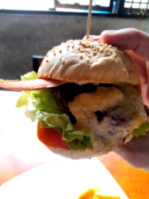 Cashew cheese facon bacon spicy bean burger with fries at Filthy Vegan in Ho Chi Minh City