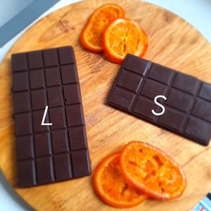 Handcrafted vegan chocolate orange bars 
Large 85,000 Dong. Small 30.000 Dong at Filthy Vegan in Ho Chi Minh City