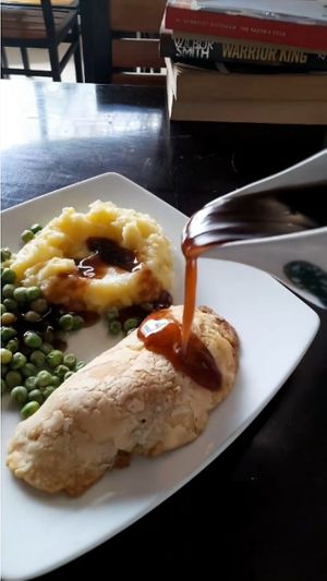 Homemade cashew cheese and onion pasty with creamy vegan mash potato, peas and Homemade vegan gravy at Filthy Vegan in Ho Chi Minh City