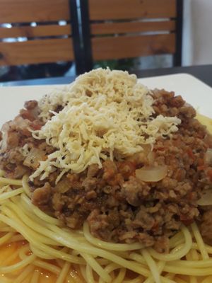 Vegan Spaghetti Bolognese with vegan cheese at Filthy Vegan in Ho Chi Minh City