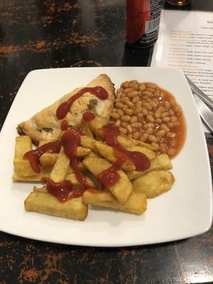 Vegan cheese and onion pasty with chips and beans   at Filthy Vegan in Ho Chi Minh City