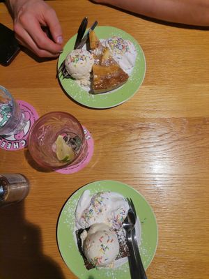 Apple Pie & Chocolate Brownie both with Vanilla Ice and Cream at Green Flamingo in Innsbruck