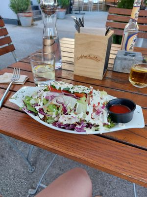 Kapsalon! Dutch dish with potato, cheese, salad and kebab pieces at Green Flamingo in Innsbruck