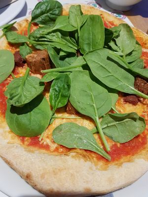 Pizza with Beyond Meat sausages at Green Flamingo in Innsbruck