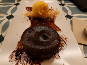 Dessert: chocolate coulant with passion fruit ice-cream at VEGA - Alamo in Madrid