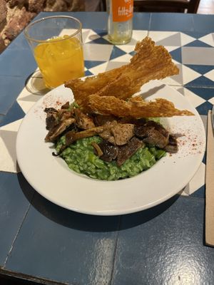 Risotto verde con setas estofadas, cherrys, pesto genovese,
espárragos y teja de "parmesano"  at VEGA - Alamo in Madrid