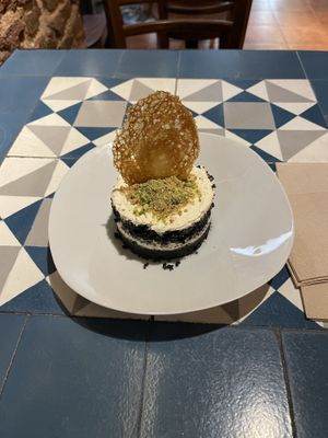Tarta de zanahoria y cerveza negra, con frosty
de limón y crema de yuzu con pistacho  at VEGA - Alamo in Madrid