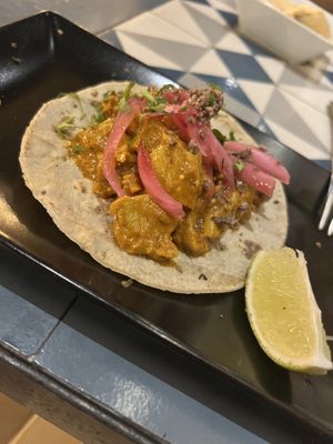 Taco with tikka masala “chicken” with pickles, cilantro, za’atar, and cauliflower   at VEGA - Alamo in Madrid