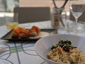 Risotto and papas en mojo at VEGA - Alamo in Madrid