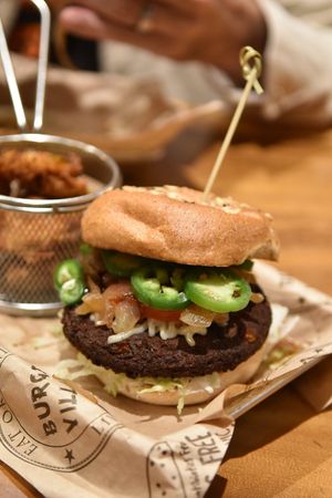 Black Bean Burger with fried pickles at Burger Village in San Luis Obispo