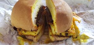 Bacon, egg and cheese with hot sauce at How Delish HD in West Orange