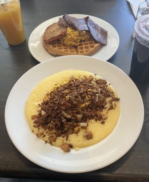 Breakfast waffle dish (top) and hash & grits dish (bottom). Both were amazing !  at How Delish HD in West Orange