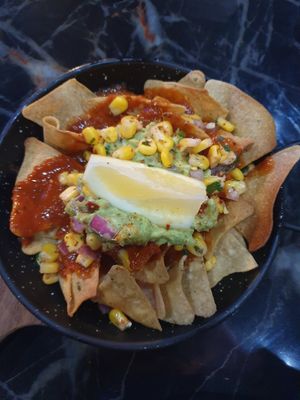 Corn chips w/salsa + guacamole $12.50 at Hecho en Mexico in Yarraville