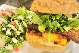 Marinated Tempeh Burger w/ creamy kale salad  at SunCafe in Studio City