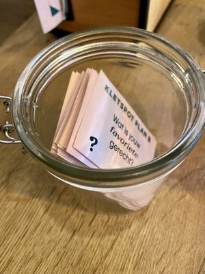 Question pots on the tables to keep the conversation going!  at Tapasbar Plan B in Breda