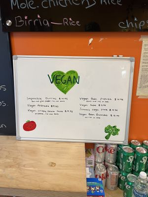 Updated menu with a tasty impossible burrito. Pretty stoked that this place had options😄 at Lola's Taqueria in Belvedere