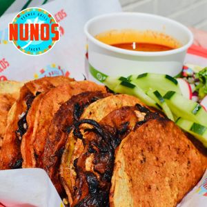 Birria Tacos, barbacoa made with Hibiscus Flowers  at Nuno's Tacos & Vegmex Grill in Dallas